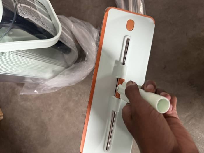 Customer photo attaching the mop head to the handle
